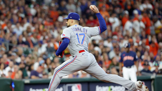 Oct 16, 2023; Houston, Texas, USA; Texas Rangers starting pitcher Nathan Eovaldi (17) pitches against the Houston Astros in the first inning in the second inning during game two of the ALCS for the 2023 MLB playoffs at Minute Maid Park. Mandatory Credit: Thomas Shea-USA TODAY Sports